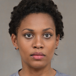 Neutral black young-adult female with short  brown hair and brown eyes