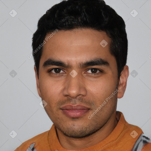 Neutral latino young-adult male with short  black hair and brown eyes