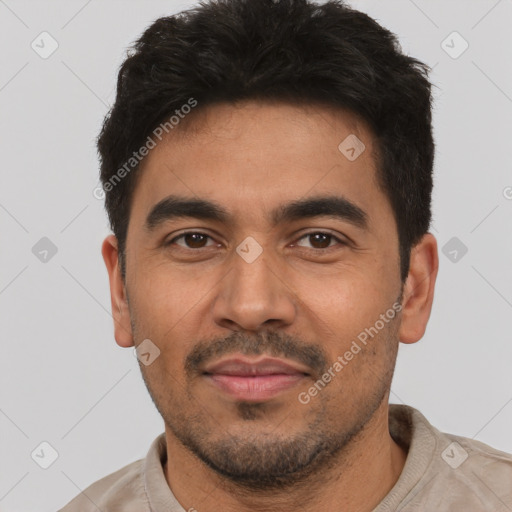 Joyful latino young-adult male with short  black hair and brown eyes