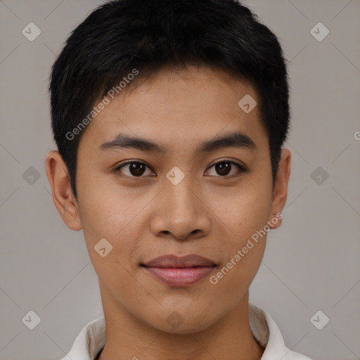 Joyful asian young-adult male with short  brown hair and brown eyes