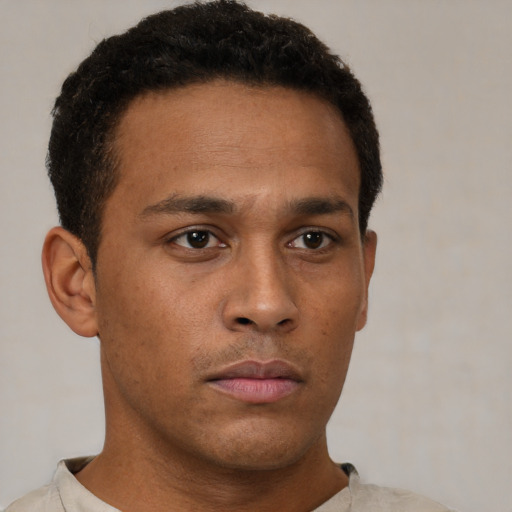 Neutral black young-adult male with short  brown hair and brown eyes