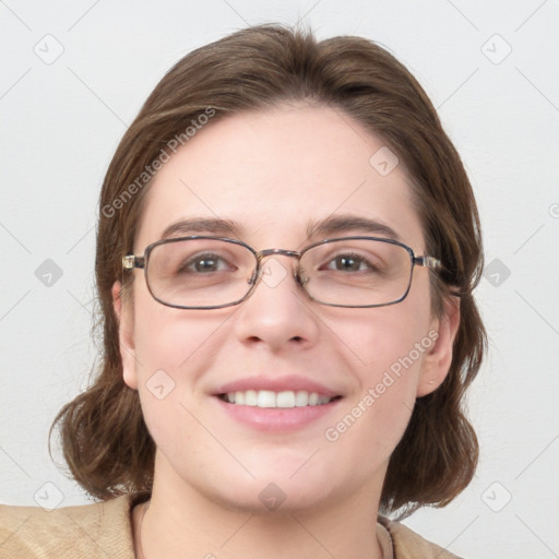 Joyful white young-adult female with medium  brown hair and blue eyes