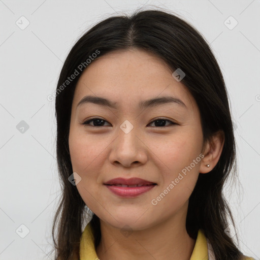 Joyful asian young-adult female with long  brown hair and brown eyes