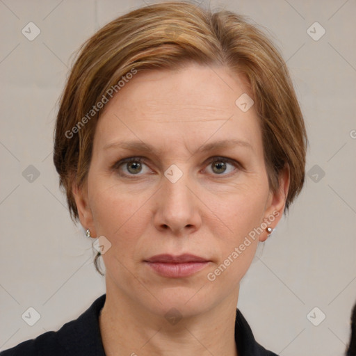 Joyful white adult female with medium  brown hair and grey eyes