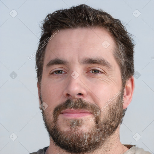 Neutral white adult male with short  brown hair and brown eyes