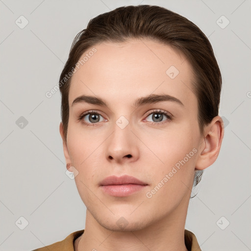 Neutral white young-adult female with short  brown hair and brown eyes