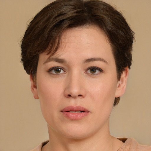 Neutral white young-adult female with short  brown hair and brown eyes