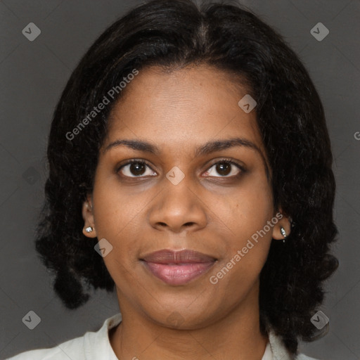 Joyful black young-adult female with medium  black hair and brown eyes