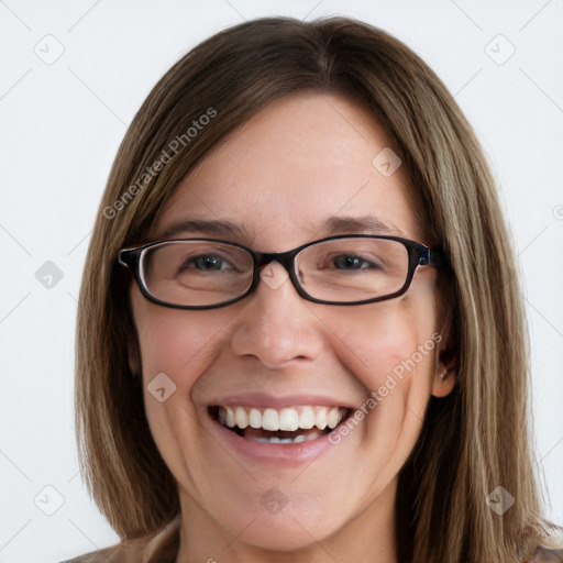 Joyful white young-adult female with long  brown hair and blue eyes