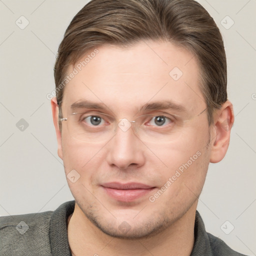 Joyful white young-adult male with short  brown hair and grey eyes