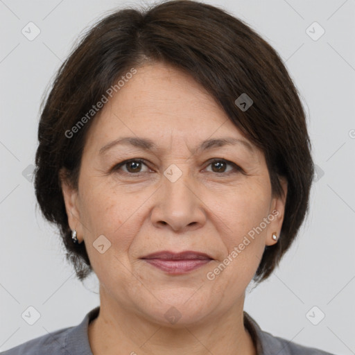 Joyful white adult female with medium  brown hair and brown eyes