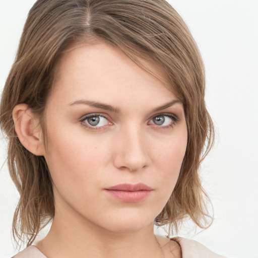 Neutral white young-adult female with medium  brown hair and grey eyes