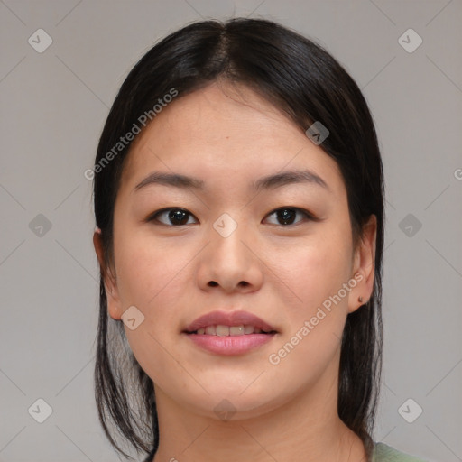 Joyful asian young-adult female with medium  brown hair and brown eyes