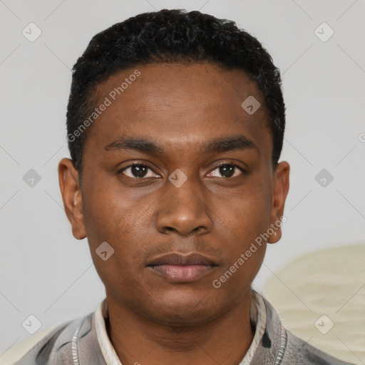 Neutral black young-adult male with short  black hair and brown eyes