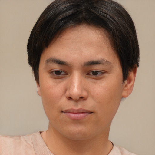 Joyful asian young-adult female with short  brown hair and brown eyes