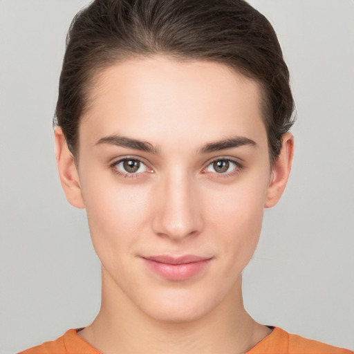 Neutral white young-adult female with short  brown hair and brown eyes