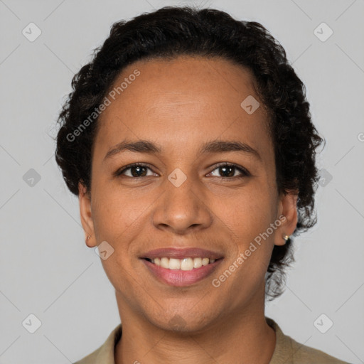 Joyful latino young-adult female with short  brown hair and brown eyes