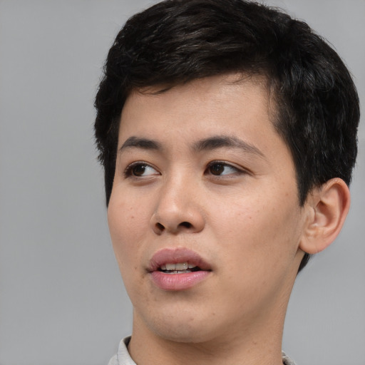 Neutral white young-adult male with short  black hair and brown eyes