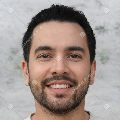 Joyful white young-adult male with short  black hair and brown eyes