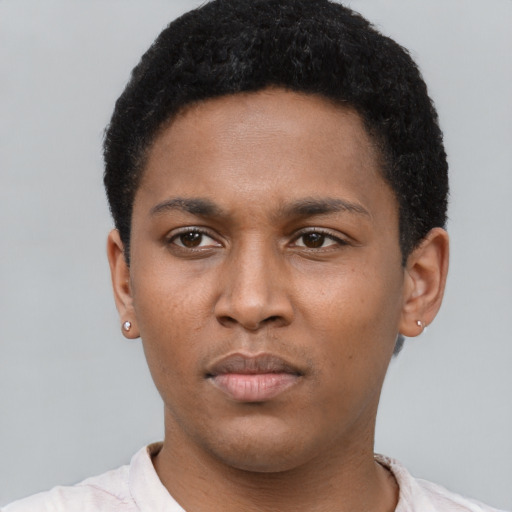 Neutral latino young-adult male with short  brown hair and brown eyes
