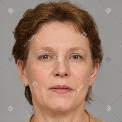 Joyful white adult female with short  brown hair and grey eyes