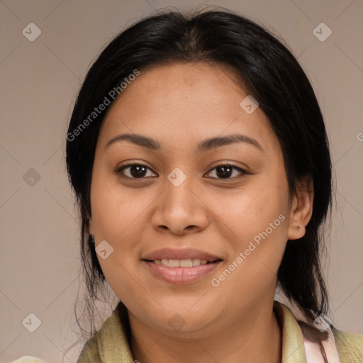 Joyful latino young-adult female with medium  brown hair and brown eyes