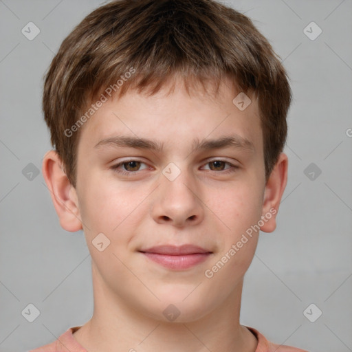 Joyful white child male with short  brown hair and brown eyes