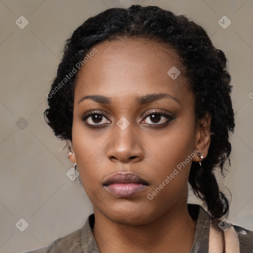 Neutral black young-adult female with medium  black hair and brown eyes