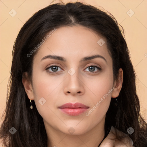 Neutral white young-adult female with long  brown hair and brown eyes