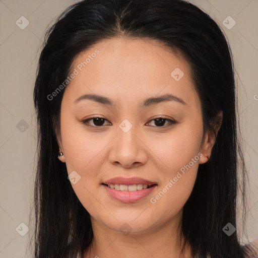 Joyful asian young-adult female with long  brown hair and brown eyes