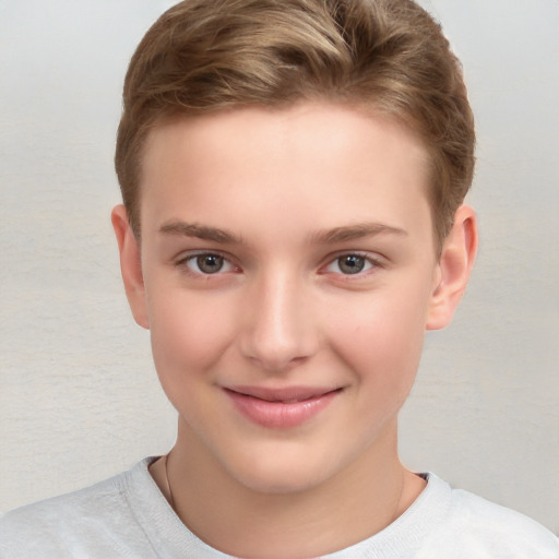 Joyful white child female with short  brown hair and brown eyes