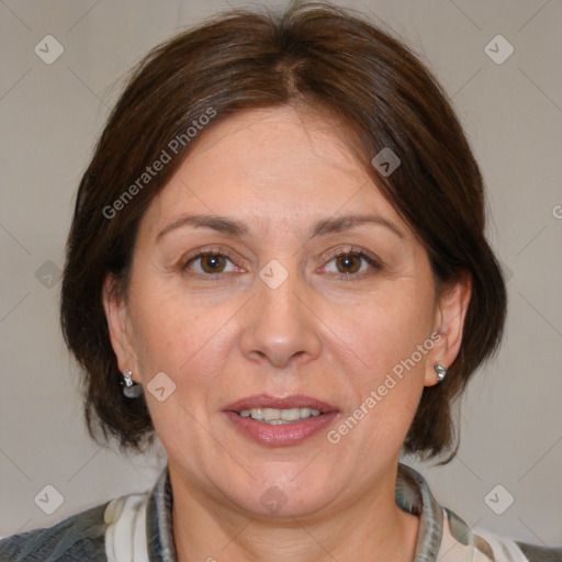 Joyful white adult female with medium  brown hair and brown eyes