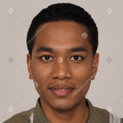 Joyful black young-adult male with short  black hair and brown eyes