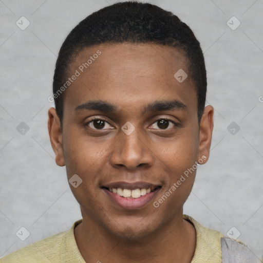 Joyful black young-adult male with short  brown hair and brown eyes