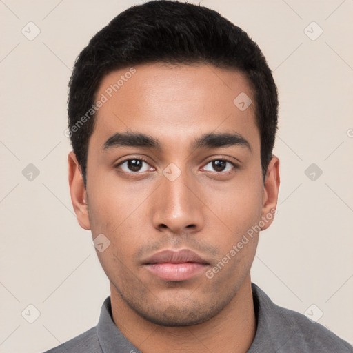 Neutral latino young-adult male with short  black hair and brown eyes