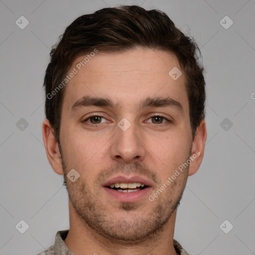 Joyful white young-adult male with short  brown hair and brown eyes