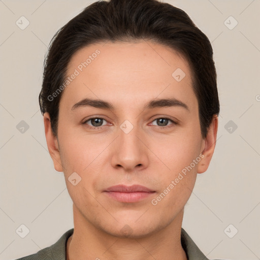 Joyful white young-adult male with short  brown hair and brown eyes