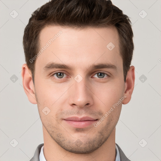 Neutral white young-adult male with short  brown hair and grey eyes