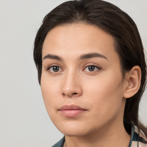 Neutral white young-adult female with medium  brown hair and brown eyes