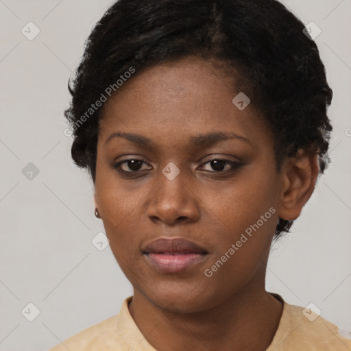 Neutral black young-adult female with short  brown hair and brown eyes