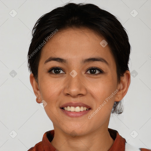 Joyful asian young-adult female with short  brown hair and brown eyes