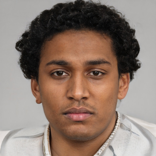 Neutral black young-adult male with short  brown hair and brown eyes