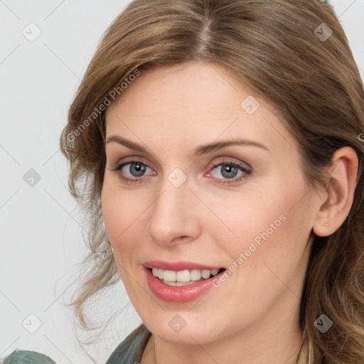 Joyful white young-adult female with medium  brown hair and blue eyes