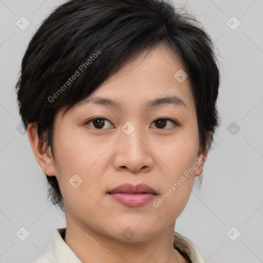 Joyful asian young-adult female with short  brown hair and brown eyes