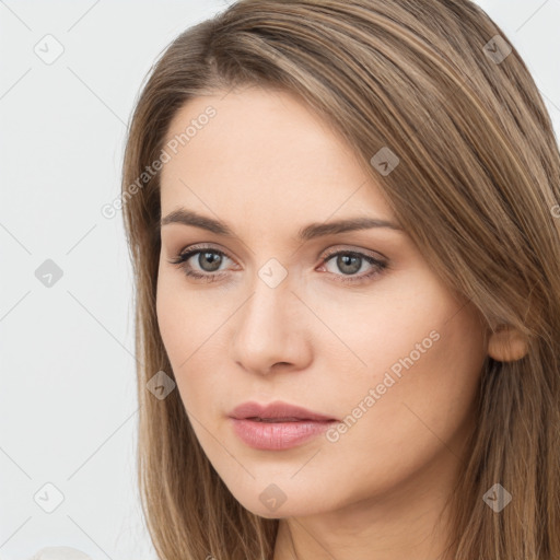 Neutral white young-adult female with long  brown hair and brown eyes