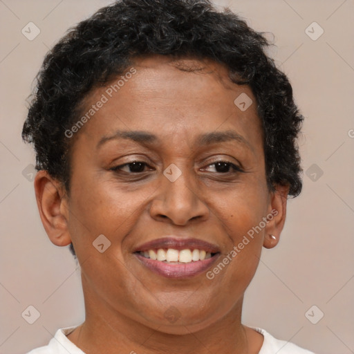 Joyful latino adult female with short  brown hair and brown eyes