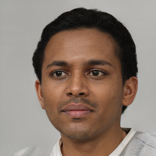 Neutral latino young-adult male with short  black hair and brown eyes