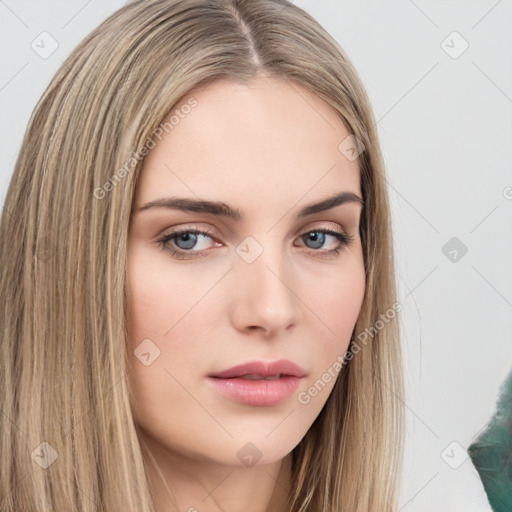 Neutral white young-adult female with long  brown hair and brown eyes