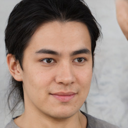 Joyful white young-adult male with medium  brown hair and brown eyes