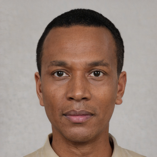 Neutral black young-adult male with short  black hair and brown eyes